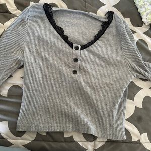 gray long sleeve and black lace shirt